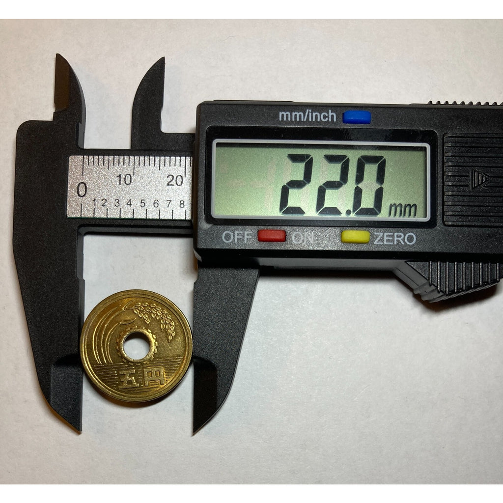 Japanese Money, 5 Yen Coin - a coin with a center hole, Random Year